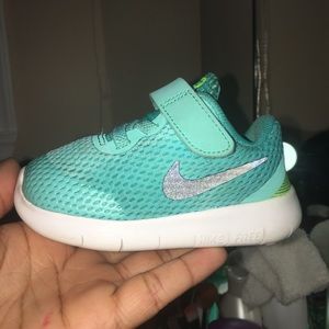 Infant Size 5 Mint Nike’s w/ neon green Embellish